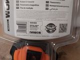 an image of a plastic case with a black and orange watch inside of it