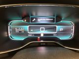 an image of a car dashboard with a digital display