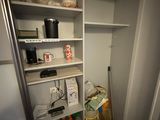 an image of a pantry with a lot of items in it