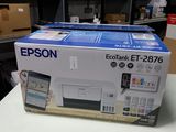 an image of a printer sitting on top of a table in a room