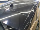 an image of a car that is parked in a garage