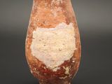 an image of a clay vase with a heart on it