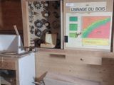 a small kitchen with a sink and a refrigerator