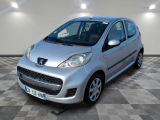 a picture of a small silver car on a checkered floor