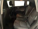 the back seats of a car are black and grey in color