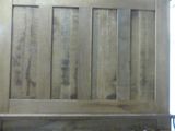 a picture of a bed with a wooden headboard and foot board