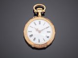 an antique gold pocket watch with roman numerals and roman numerals