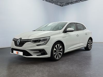a white car in a white room with a black floor