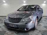 a silver car that is parked in a room