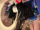 a picture of a cluttered bathroom sink with many items