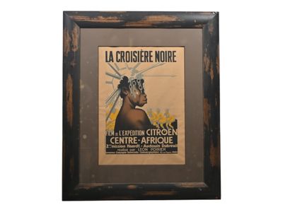 framed picture of a poster of a woman in a headdress