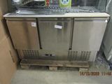 an image of a kitchen with a refrigerator and a dishwasher