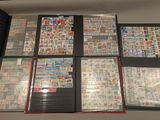 many different types of stamps on display in a display case