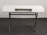 an image of a white desk with a drawer on it