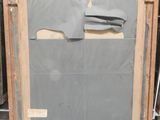 a picture of a painting in a wooden frame on the floor