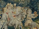 a tapestry with a picture of a couple riding on a horse