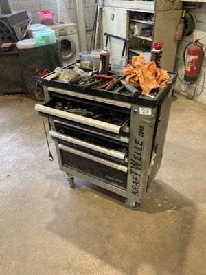 an image of a workbench with tools on it in a garage