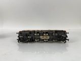 a close up of a toy train on a white surface