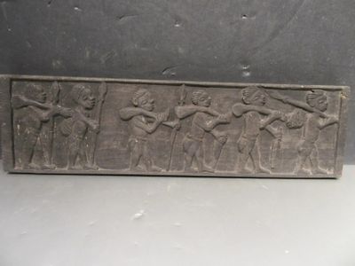 an image of a stone plaque with a group of people on it