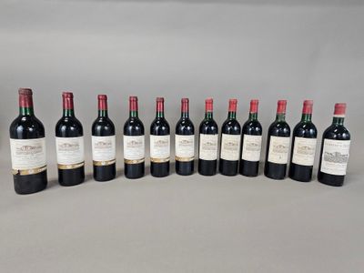 a group of bottles of wine sitting on top of a table
