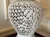 a lamp that is sitting on a table with a lamp on it