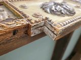 a picture of a wooden table with a picture on it