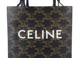 a black and gold handbag with the name celine on it