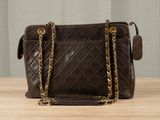 brown quilted leather shoulder bag with gold chain strap