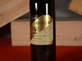 a bottle of wine that is sitting on a table