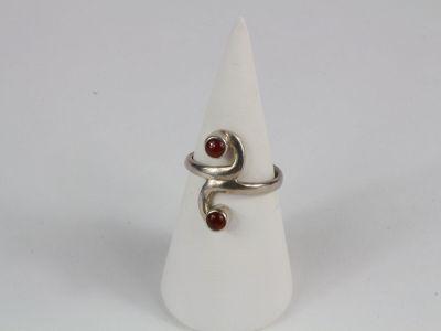 sterling silver ring with garnett and garnett on it