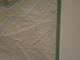 a picture of a piece of paper on the wall