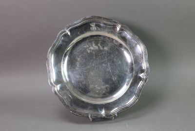 a silver plate that is sitting on a table