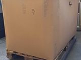 a large box sitting on a pallet in a warehouse