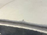 a close up of a metal object on a table
