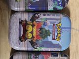 six skateboards lined up in a row on a wooden surface