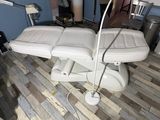 an image of a medical examination table in a room