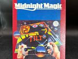 the box of the video game midnight magic is sitting on the table