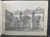 un livre ouvert dans lequel figure le dessin d'un bâtiment