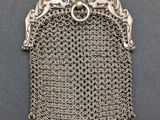 an antique silver chainmail purse with pearls and beads
