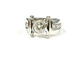 une image d'une bague en diamant sur fond blanc