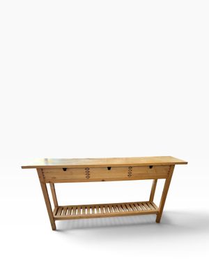 an image of a wooden table with a shelf underneath it