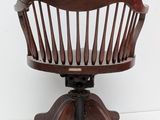 an image of a wooden chair sitting on top of a white floor