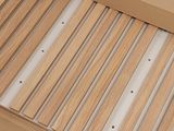 underside view of a wooden bed with slats and a mattress