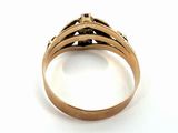 an image of a gold ring with black diamonds