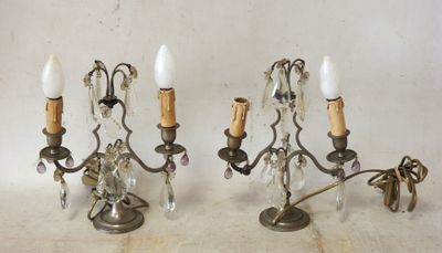 two candles that are sitting on a table