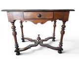 a small table with a drawer on top of it