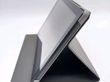 a tablet that is sitting on top of a stand