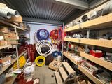a room filled with lots of different types of pipes and hoses