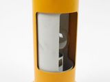 an image of a yellow light that is on top of a table