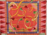 a picture of a wall hanging with a picture of apples on it